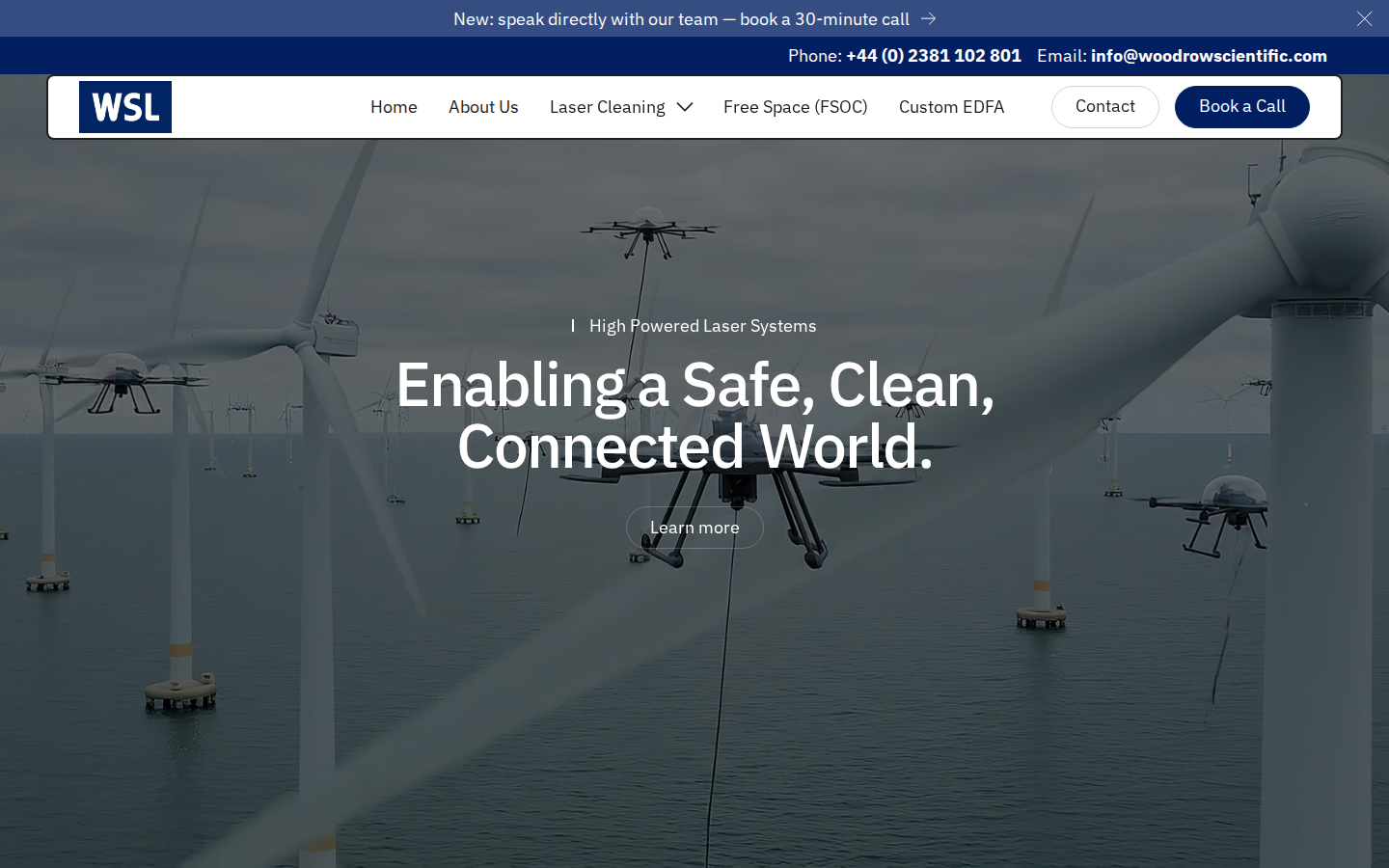 Woodrow Scientific Limited homepage hero with headline 'Enabling a Safe, Clean, Connected World.' and Learn more CTA