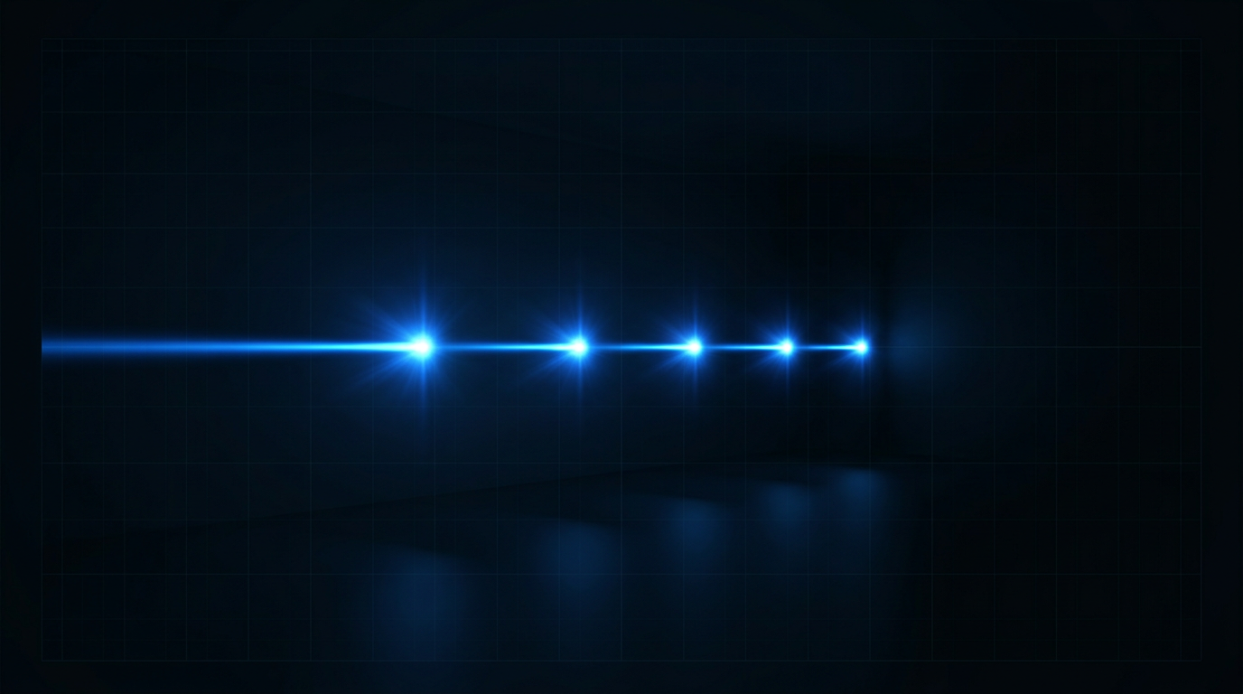 Pulsed laser beam traveling horizontally through dark space, showing discrete, well-separated bursts of electric blue light representing individual energy delivery events.