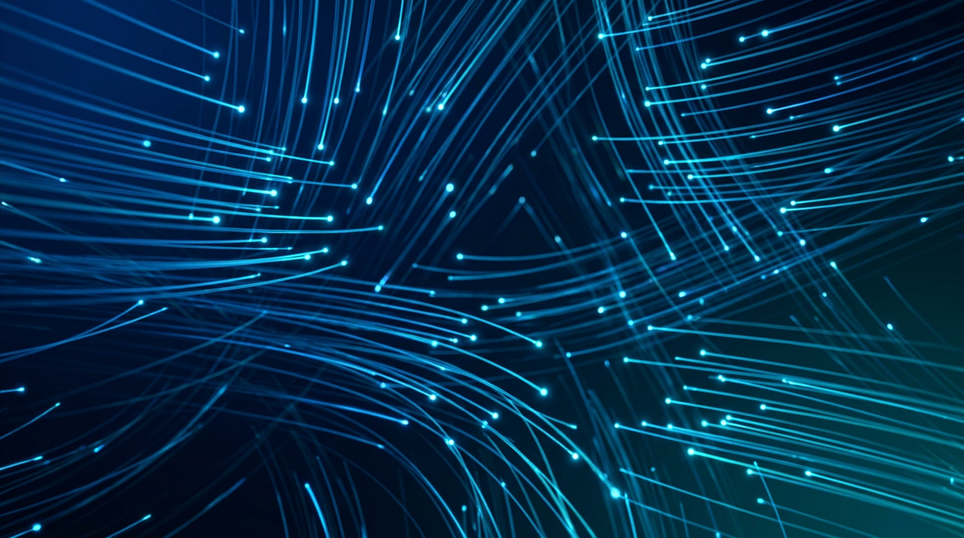 Dense web of glowing electric blue and cyan fibre strands with light pulses traversing through deep navy void, suggesting three-dimensional optical data transmission.